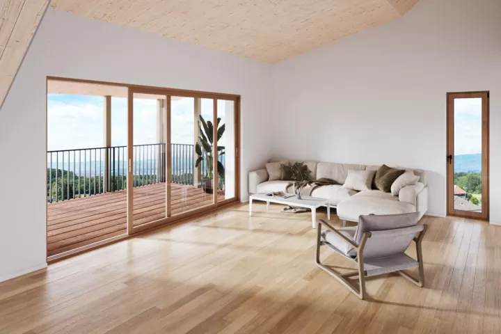 Visualisierung: heller Wohnraum mit Holzdecke und Terrasse im Neubau Daheim im OBERdorf in Ammerzwil